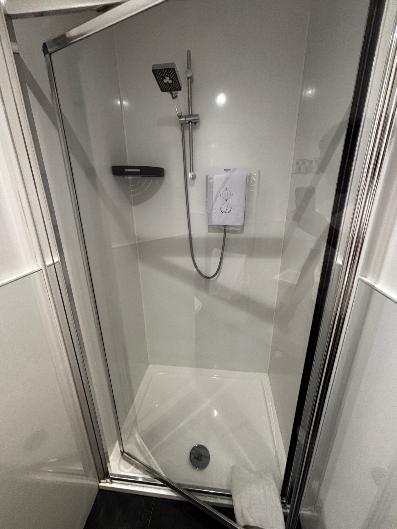 Shower enclosure gleaming after a NordSpark bathroom clean